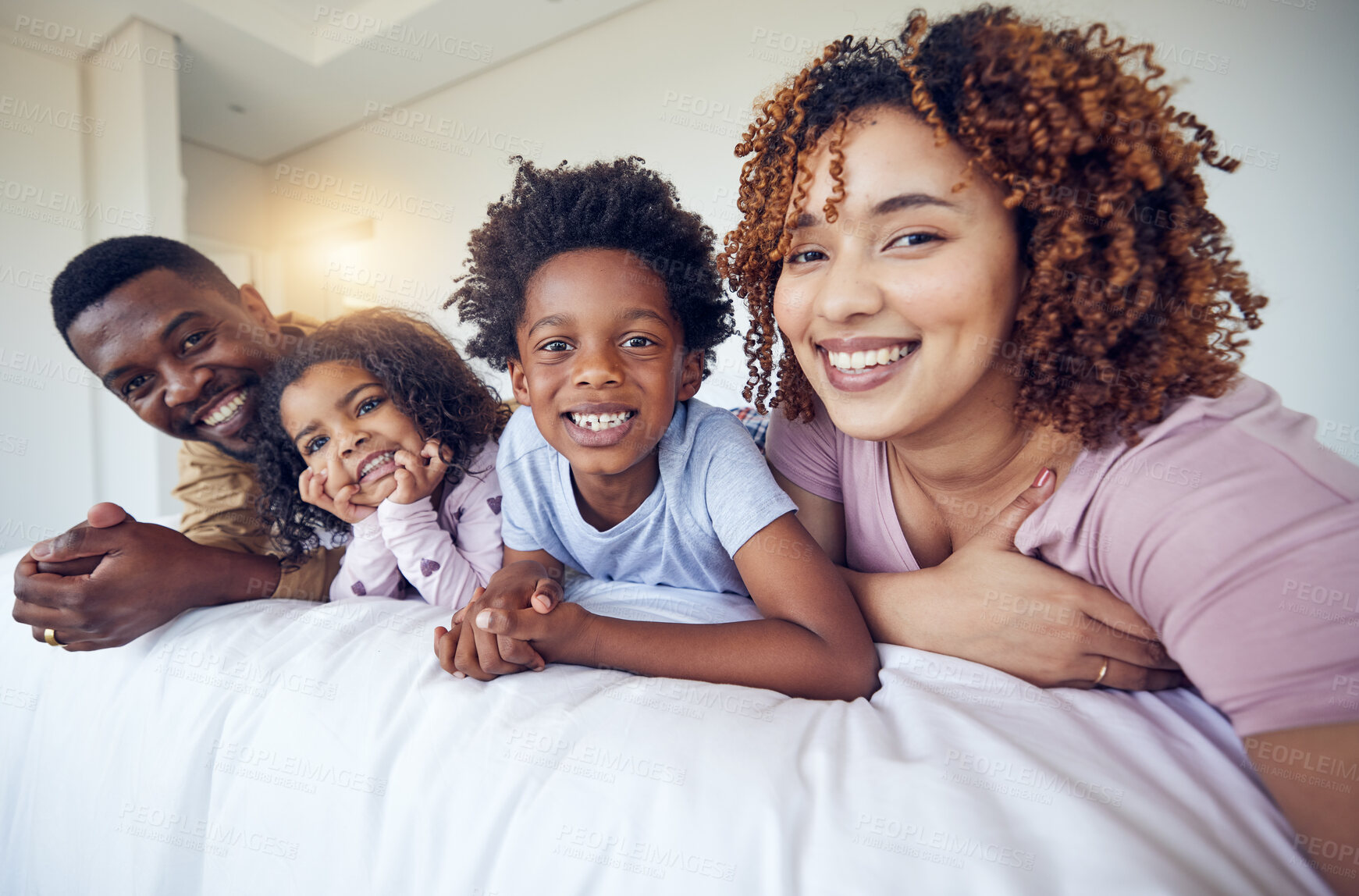 Buy stock photo Portrait, selfie and happy family relax in bed, smile and cheerful in the home during morning together. Face, photo and children resting indoors with parents and pose for profile picture and memory