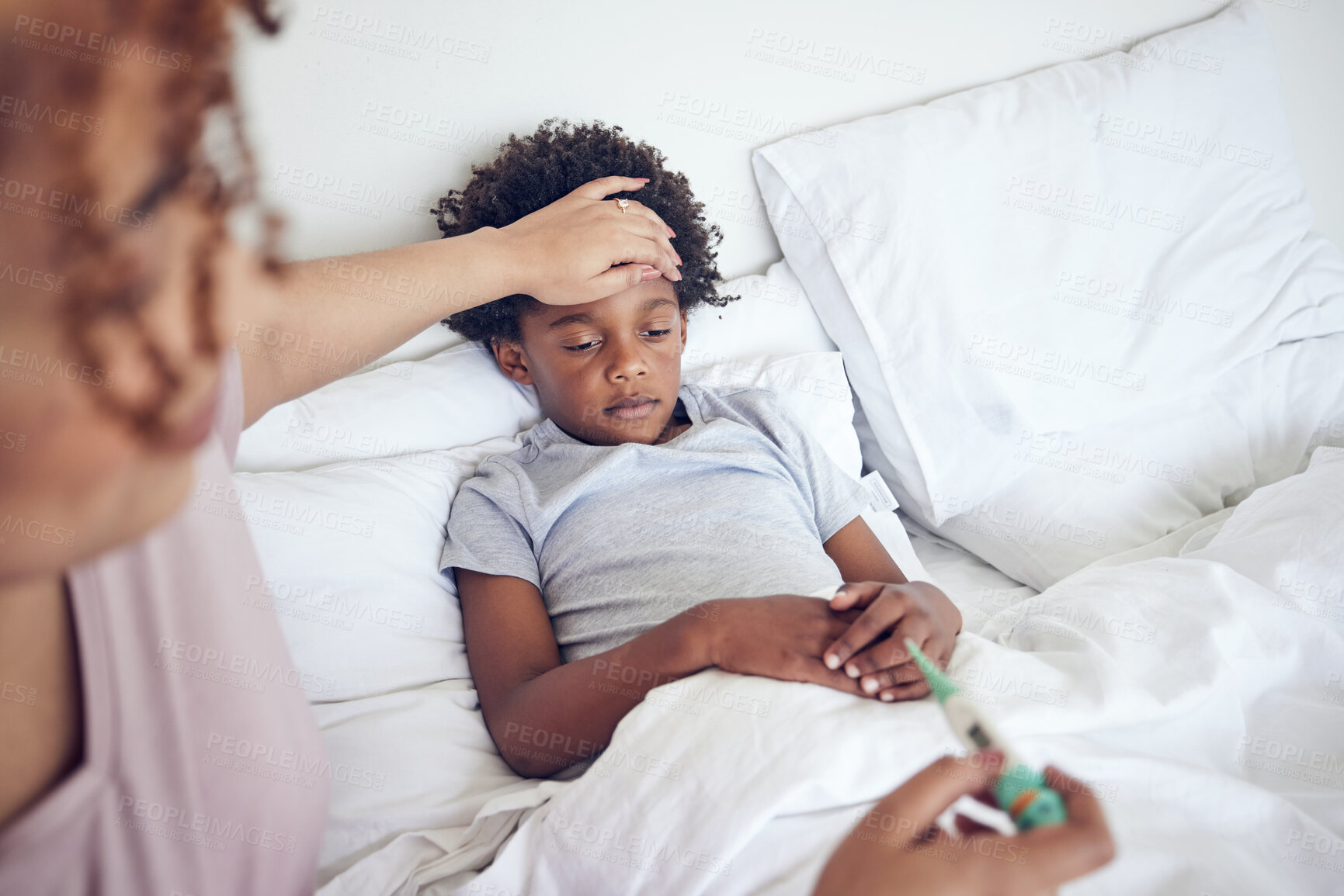 Buy stock photo Sick child in bed, mother check temperature and fever, cold or flu with virus and healthcare. Love, support and health problem, woman take care of boy at family home with illness and thermometer