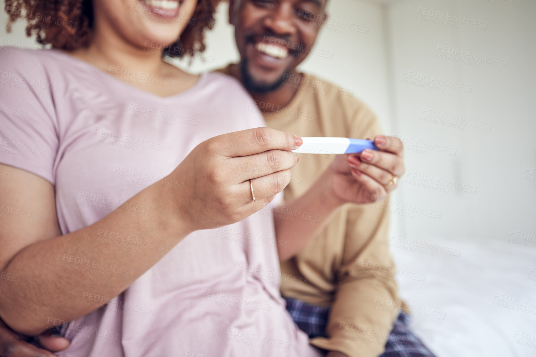 Buy stock photo Pregnancy test in hands, happiness with fertility and people having a baby, happy couple with love and care at home. Interracial, black man and pregnant woman, start family with new mother and father