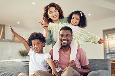 Buy stock photo Happy family, piggyback and portrait of kids with parents on a sofa, smile and cheerful while bonding in their home. Airplane, fun and face of children with mother and father in living room together