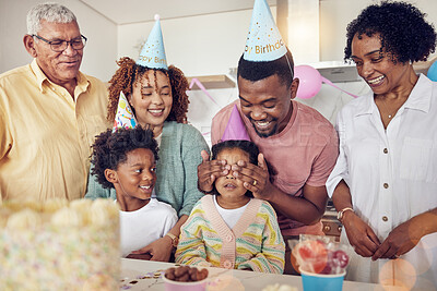 Buy stock photo Birthday, party and surprise with family in kitchen for celebration, bonding and affectionate. Happiness, excited and care with parents and child at home for generations, fun and special event 