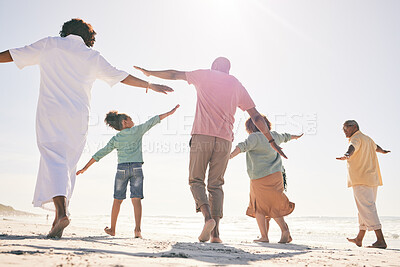 Buy stock photo Family on beach, freedom and generations on vacation with fun and grandparents, parents and kids. Travel, people outdoor and carefree, excited running and playful, happiness on adventure back view