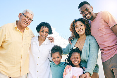 Buy stock photo Hug, happy and portrait of an interracial family with a smile, happiness and care on the lawn. Looking, diversity and parents, grandparents and children with love, smiling and bonding in the garden