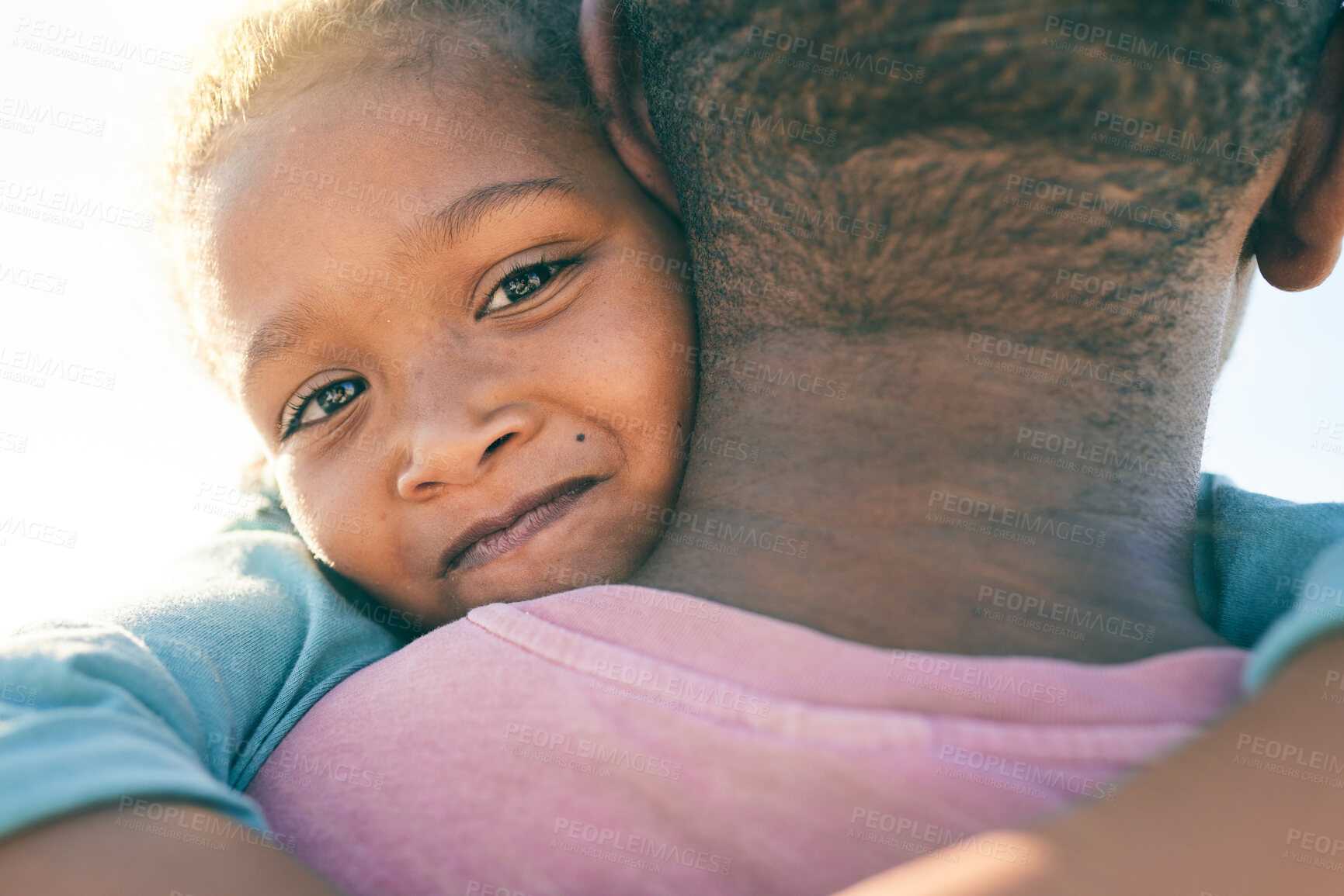 Buy stock photo Face portrait, child or black family hug, embrace or bond on outdoor vacation for peace, freedom and quality time. Sunshine flare, love or African youth kid, father or people together in South Africa