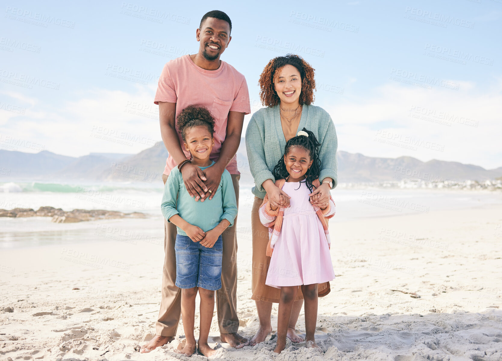 Buy stock photo Happy portrait, nature and black family on beach holiday for peace, freedom and outdoor quality time together. Love, ocean sea sand or Jamaica children, father and mother smile with vacation sunshine