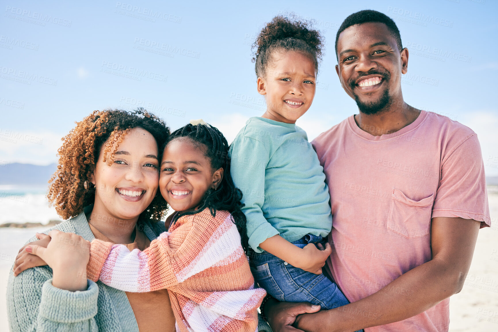 Buy stock photo Love, beach portrait and happy black family on holiday for peace, freedom and outdoor quality time together. Nature sunshine, summer happiness or Nigeria children, father and mother smile on vacation