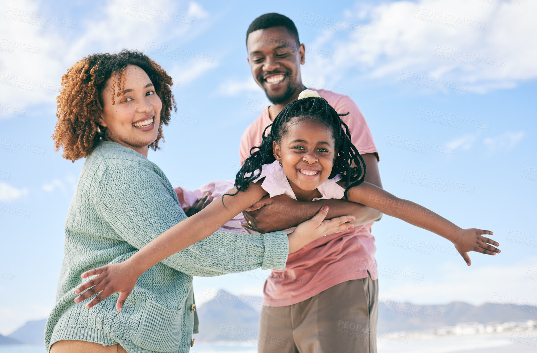 Buy stock photo Portrait, fly or girl with parents at beach on summer holiday vacation or weekend together as a happy family. African father, fun mother or excited child love bonding, relaxing or playing in nature 