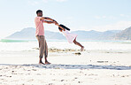 Ocean, black man swinging child and playful family holiday in Australia with freedom and energy. Travel, spinning and happy father and girl with smile playing and bonding together on beach vacation.