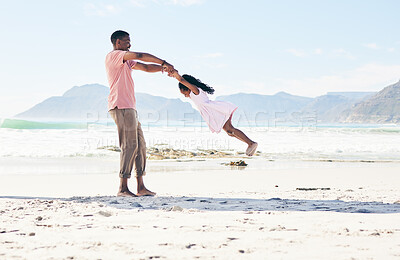 Buy stock photo Ocean, black man swinging child and playful family holiday in Australia with freedom and energy. Travel, spinning and happy father and girl with smile playing and bonding together on beach vacation.