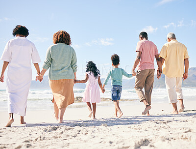 Buy stock photo Family walk on beach sand, holding hands and generations, people outdoor with grandparents, parents and kids. Together, support and trust, travel to Bali with love, care and bond with back view 