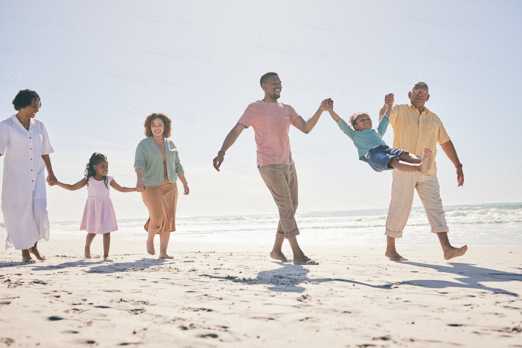 Buy stock photo Family walk beach, freedom and travel, generations and happy people, grandparents with parents and kids. Adventure, outdoor with dad and grandfather swing kid, fun on holiday with hand holding