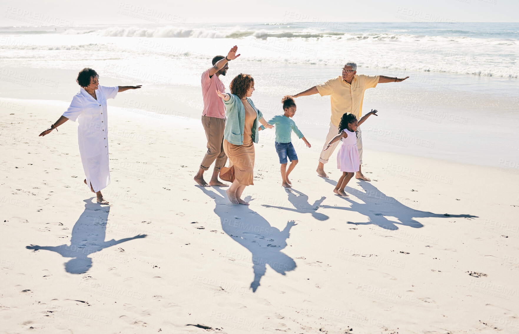 Buy stock photo Family have fun on beach, freedom and generations with travel  and grandparents with parents and kids. Adventure, happy people outdoor and carefree, excited running and playful, happiness on vacation