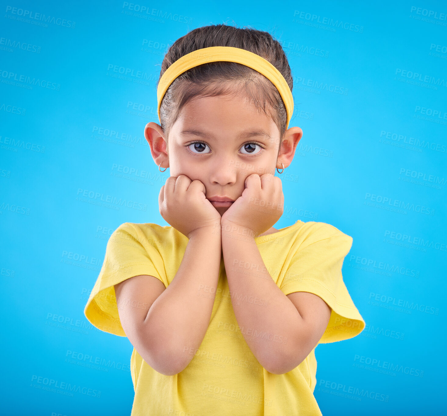 Buy stock photo Mockup, portrait and girl nervous, scared and overwhelmed against a blue studio background. Face, female child and kid with anxiety, stress and worried with mental health, anxious and panic reaction