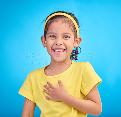 Buy stock photo Child laugh, happy portrait and smile of a little girl in a studio with blue background feeling cute. Happiness, adorable and face of a confident, playful and fun kid laughing about a funny joke 