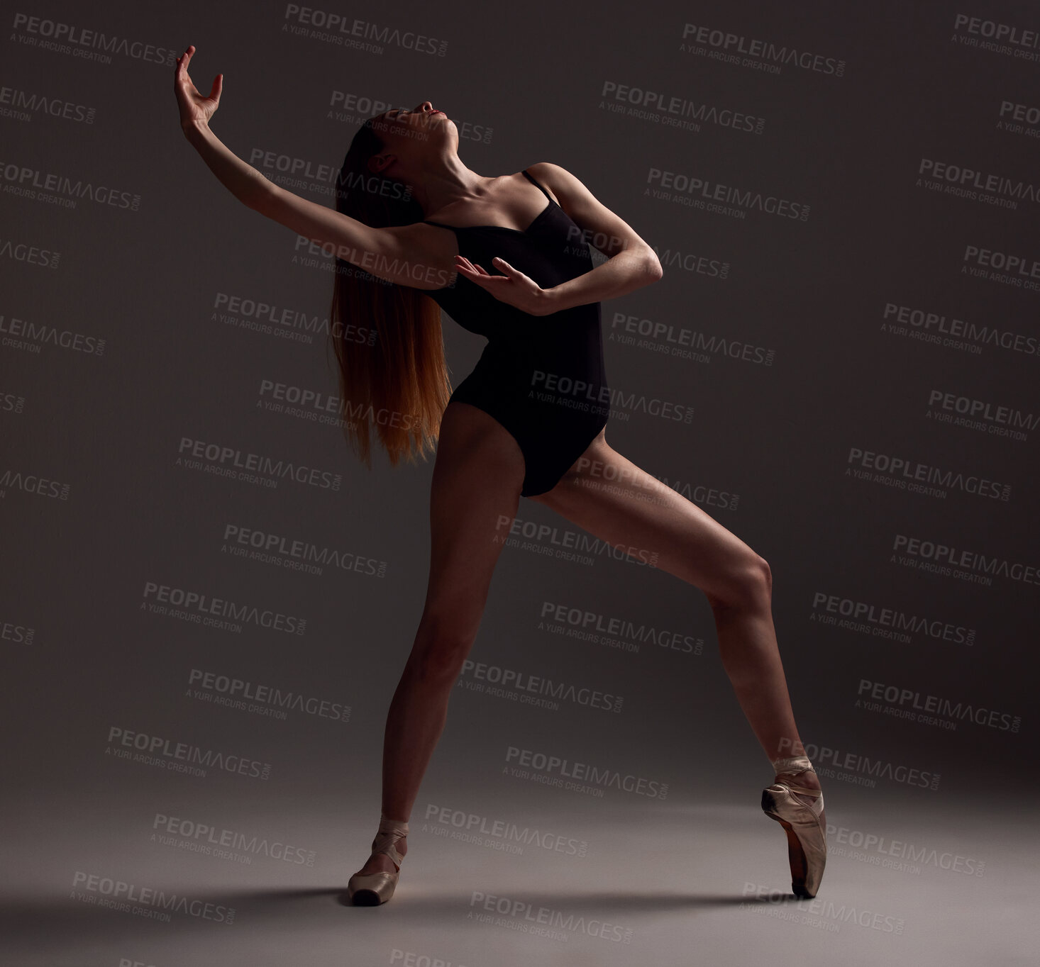 Buy stock photo Ballet, woman and dancer with pose, exercise and training for performance on a dark studio background. Female performer, ballerina and artist with technique, practice routine for show and elegant art