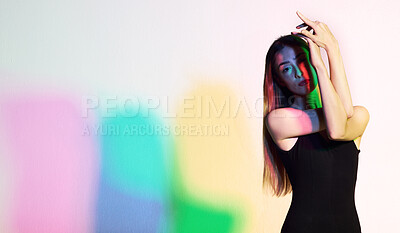 Buy stock photo Beauty, light and fashion with portrait of woman for creative, aesthetic or neon glow. Cosmetics, kaleidoscope and disco with model and cmyk color for designer, art or party on white background.