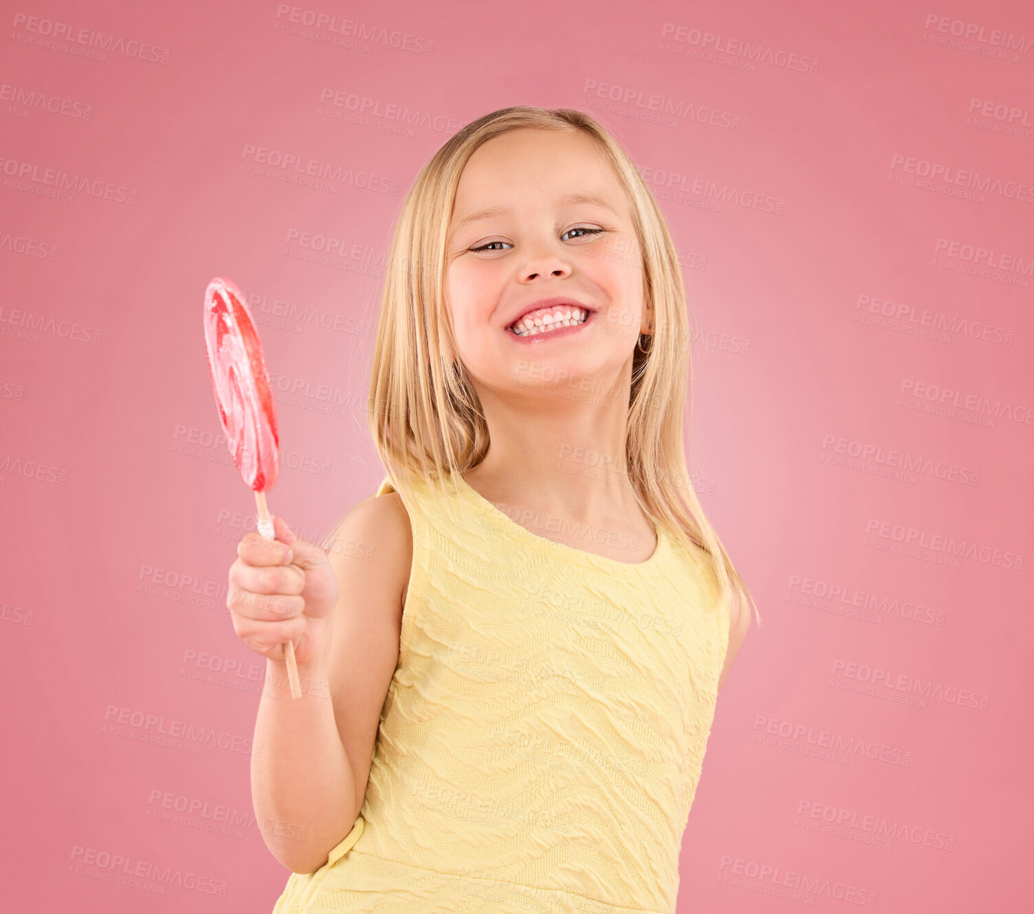 Buy stock photo Candy, smile and lollipop with portrait of girl in studio for sugar, party and carnival food isolated on pink background. Cute, positive and youth with child and eating snack for playful and treats  