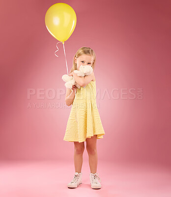 Buy stock photo Teddy bear kiss, balloon and girl portrait with a soft toy with happiness and love for toys in a studio. Isolated, pink background and a young female child feeling happy, joy and cheerful with friend