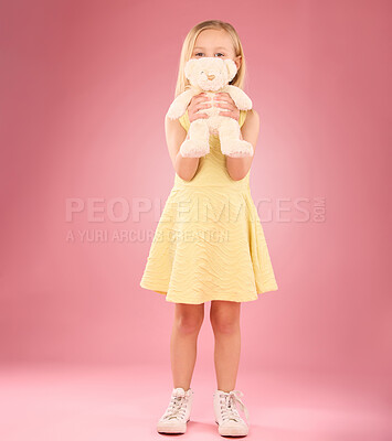 Buy stock photo Teddy, girl and portrait with a kids soft toy with happiness and love for toys in a studio. Isolated, pink background and a young female child feeling happy, joy and cheerful with bear friend