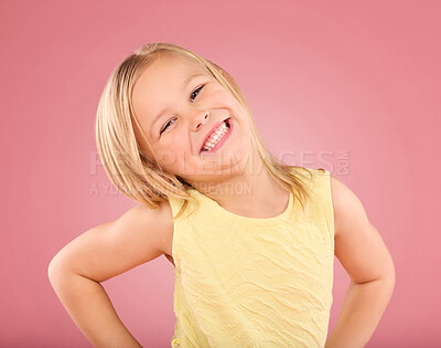 Buy stock photo Smile, cute and portrait of a posing child isolated on a pink background in a studio. Happy, adorable and an excited young girl with happiness, smiling and excitement with a pose on a backdrop