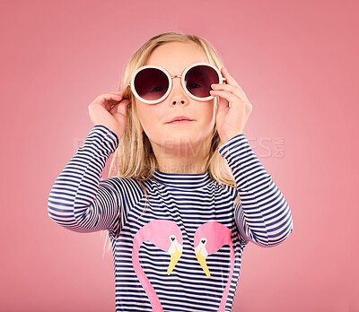 Buy stock photo Studio, portrait of small girl with sunglasses and fun clothes on vacation isolated on pink background. Summer, holiday and cool fashion clothing, happy child in Australia for travel and adventure