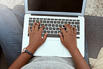 Laptop, woman and hands typing on a keyboard while working on a freelance project at her house. Technology, research and closeup of female working on a report with a computer in living room at home.