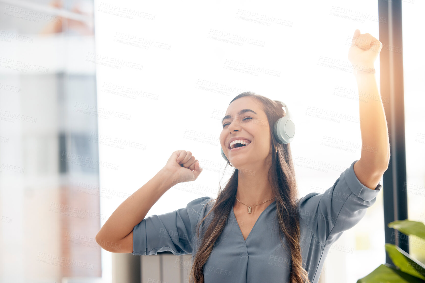 Buy stock photo Business woman, headphones and dance in office for happiness, motivation and fun celebration of smile. Happy female employee, dancing and laughing to music for success, inspiration and excited energy