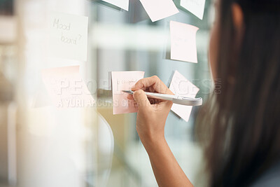 Buy stock photo Hands, brainstorming and woman writing notes for office schedule, agenda and mindmap goals at window. Closeup female employee planning ideas at glass for solution, information and strategy objectives