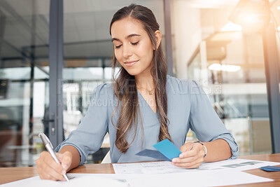 Buy stock photo Business woman writing documents at office desk of administration, strategy solution or project notes. Female worker planning paperwork, ideas or management of professional company reports in startup