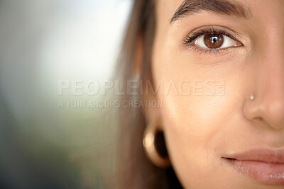 Buy stock photo Business woman, portrait and face closeup with mock up and eye vision with blurred background. Young female, gen z person and entrepreneur with beauty and facial piercing feeling relax with mockup