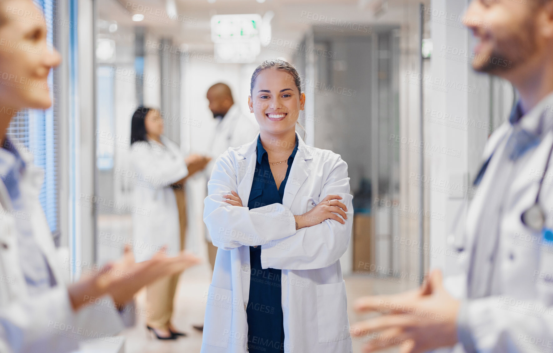 Buy stock photo Proud, happy woman doctor with leadership, staff management and hospital workflow or clinic solution. Healthcare manager with job mindset for medical team or doctors communication in health service