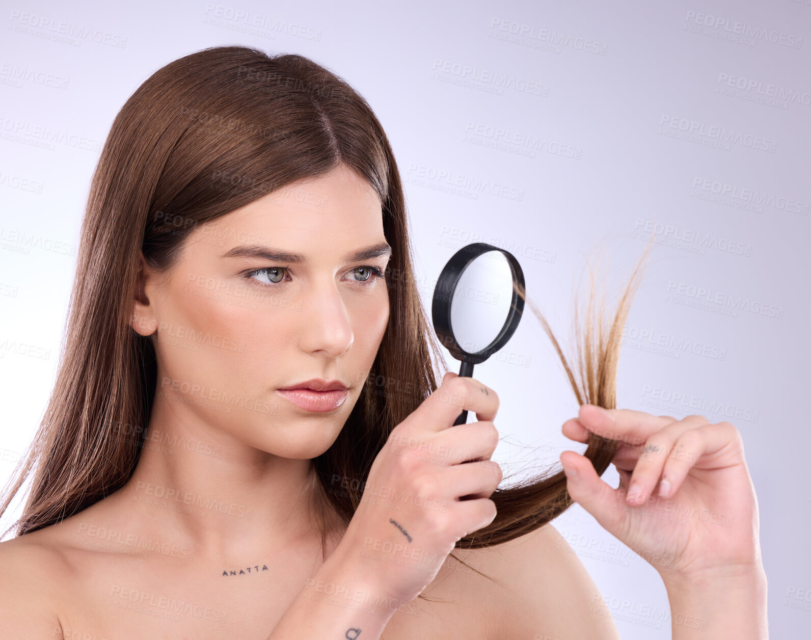 Buy stock photo Hair care, beauty split ends and woman with magnifying glass in studio isolated on a background. Cosmetics, female and model face with lens for hairstyle, hairloss and damage after salon treatment.