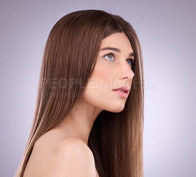 Buy stock photo Face, beauty and hair care of a woman in studio isolated on a gray background. Makeup cosmetics, thinking and young female model with salon treatment for healthy keratin, balayage or hairstyle growth