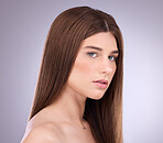 Face portrait, beauty and hair care of a woman in studio isolated on gray background. Makeup cosmetics, growth and female model with salon treatment for healthy keratin, balayage or hairstyle texture