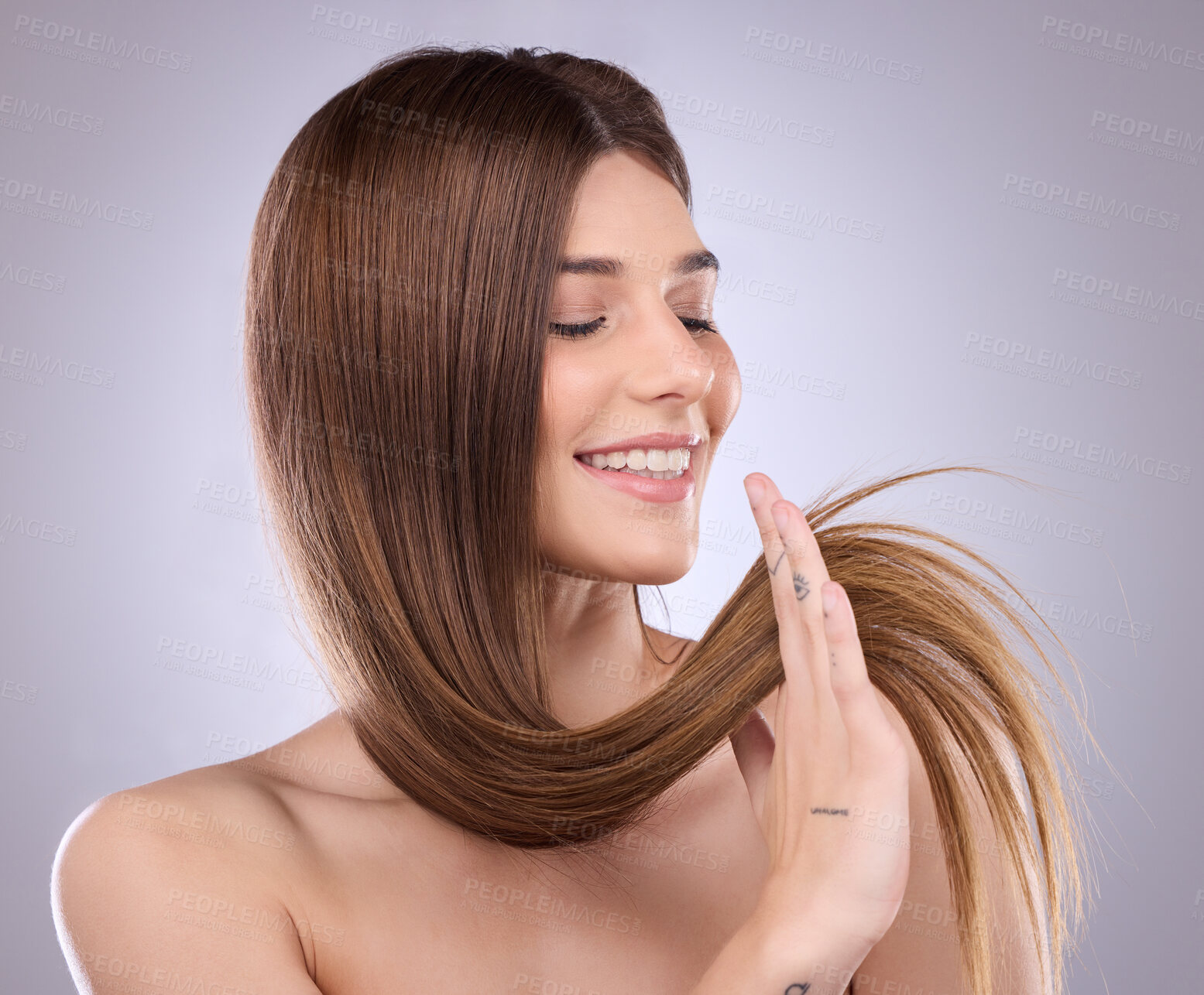 Buy stock photo Smile, beauty and haircare of a woman with straight hair in studio isolated on a background. Natural cosmetics, growth or happy female model with salon treatment for healthy keratin or long hairstyle