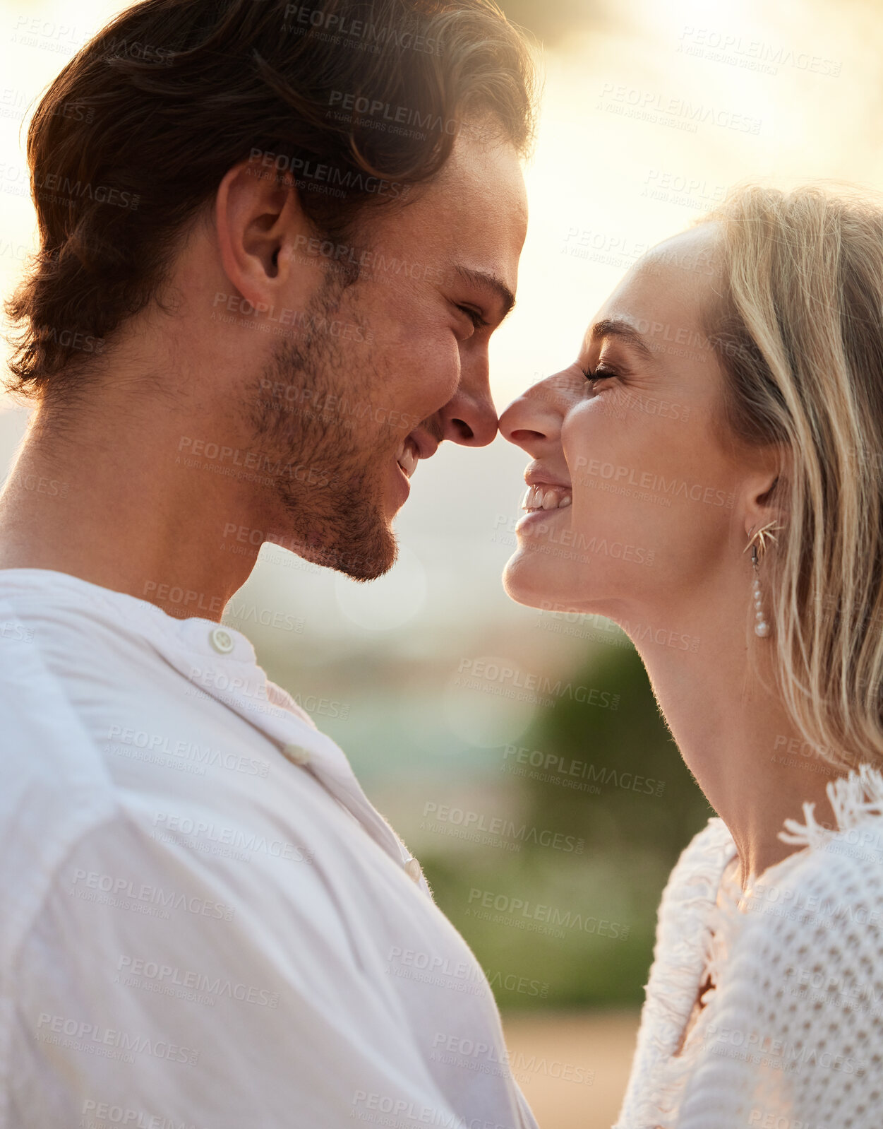 Buy stock photo Happy, love and couple in nature with admiration, laughing and bonding in the countryside of Spain. Smile, care and man and woman looking caring, playful and dating in a park with happiness together