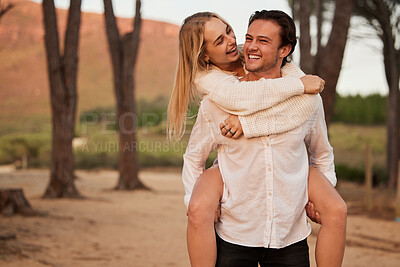 Buy stock photo Laugh, love and sunset with couple and piggyback in nature for romance, affectionate and bonding. Happiness, relax and smile with man carrying woman on date for vacation, cute and sweet relationship