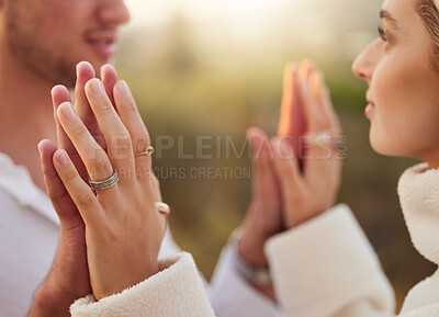 Buy stock photo Love, romance and couple touch hands at sunset for bonding, quality time and romantic weekend. Dating, honeymoon and man and woman with palms together for trust, support and loving for engagement