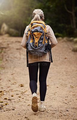 Buy stock photo Girl hiking, back view or woman in nature, forest or wilderness for a trekking adventure. Freedom, backpack healthy female hiker walking in a natural park or woods for exercise or wellness on holiday