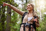 Hiking, pointing or girl in nature, forest or wilderness for a happy trekking adventure with freedom. Excited woman or hiker walking in a natural park or woods for exercise or wellness on holiday