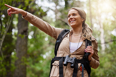 Buy stock photo Hiking, pointing or girl in nature, forest or wilderness for a happy trekking adventure with freedom. Excited woman or hiker walking in a natural park or woods for exercise or holiday vacation view