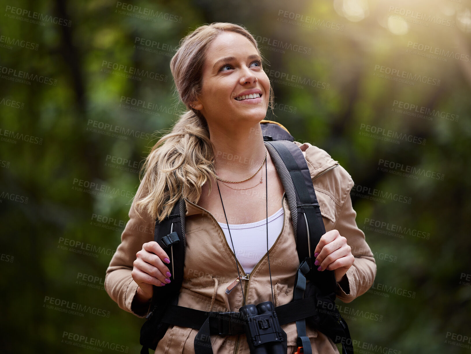 Buy stock photo Hiking, thinking and forest with a woman outdoor, walking in nature or the wilderness for adventure. Freedom, location and woods with an attractive young female hiker taking a walk in a natural park