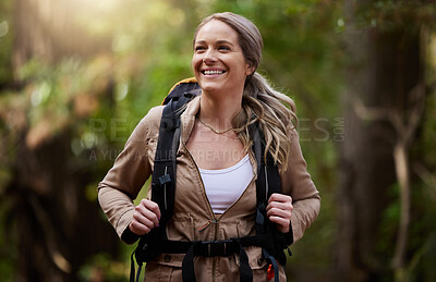 Buy stock photo Hiking, happy and forest with a woman outdoor, walking in nature or the wilderness for adventure. Freedom, location and woods with an attractive young female hiker taking a walk in a natural park