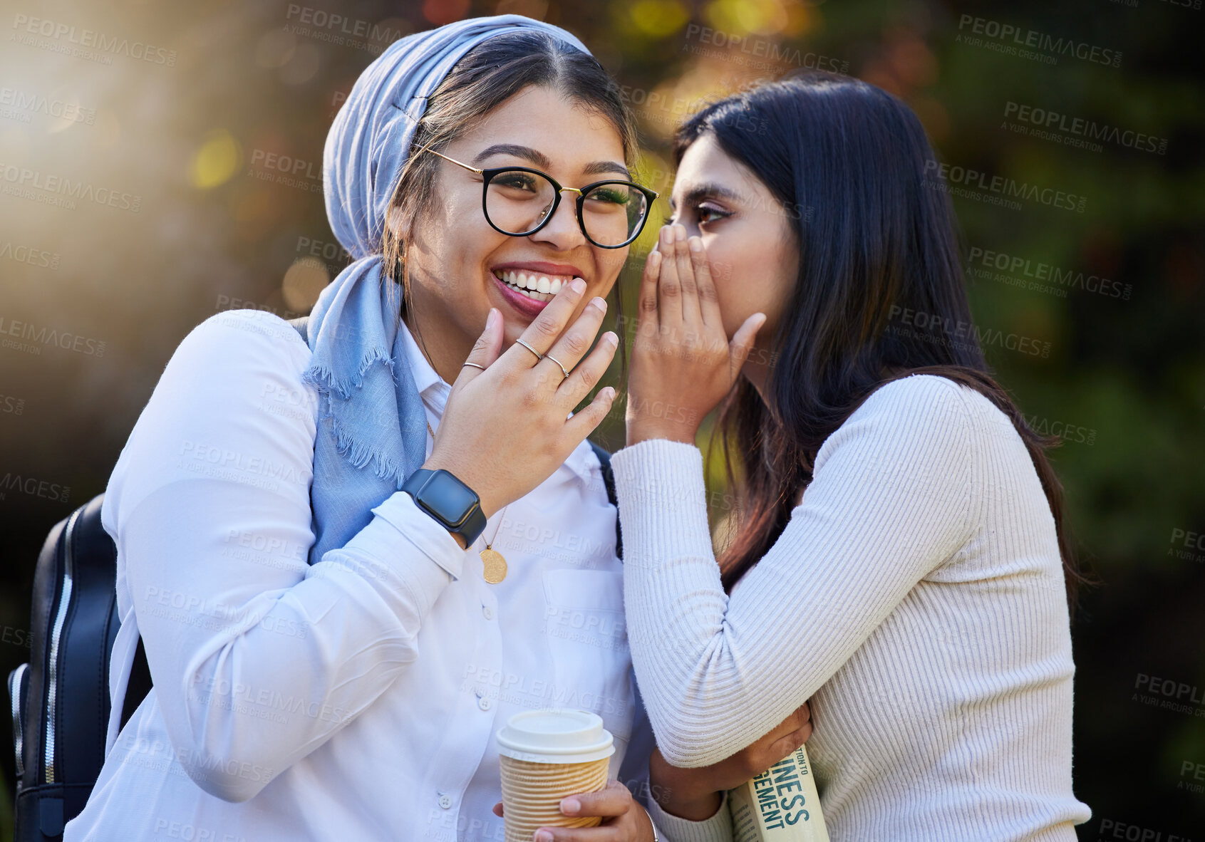 Buy stock photo Friends, gossip and women talking, outdoor and share news with smile, surprise an cheerful together. Girls, female students and young people with happiness, whisper in ear and conversation in park