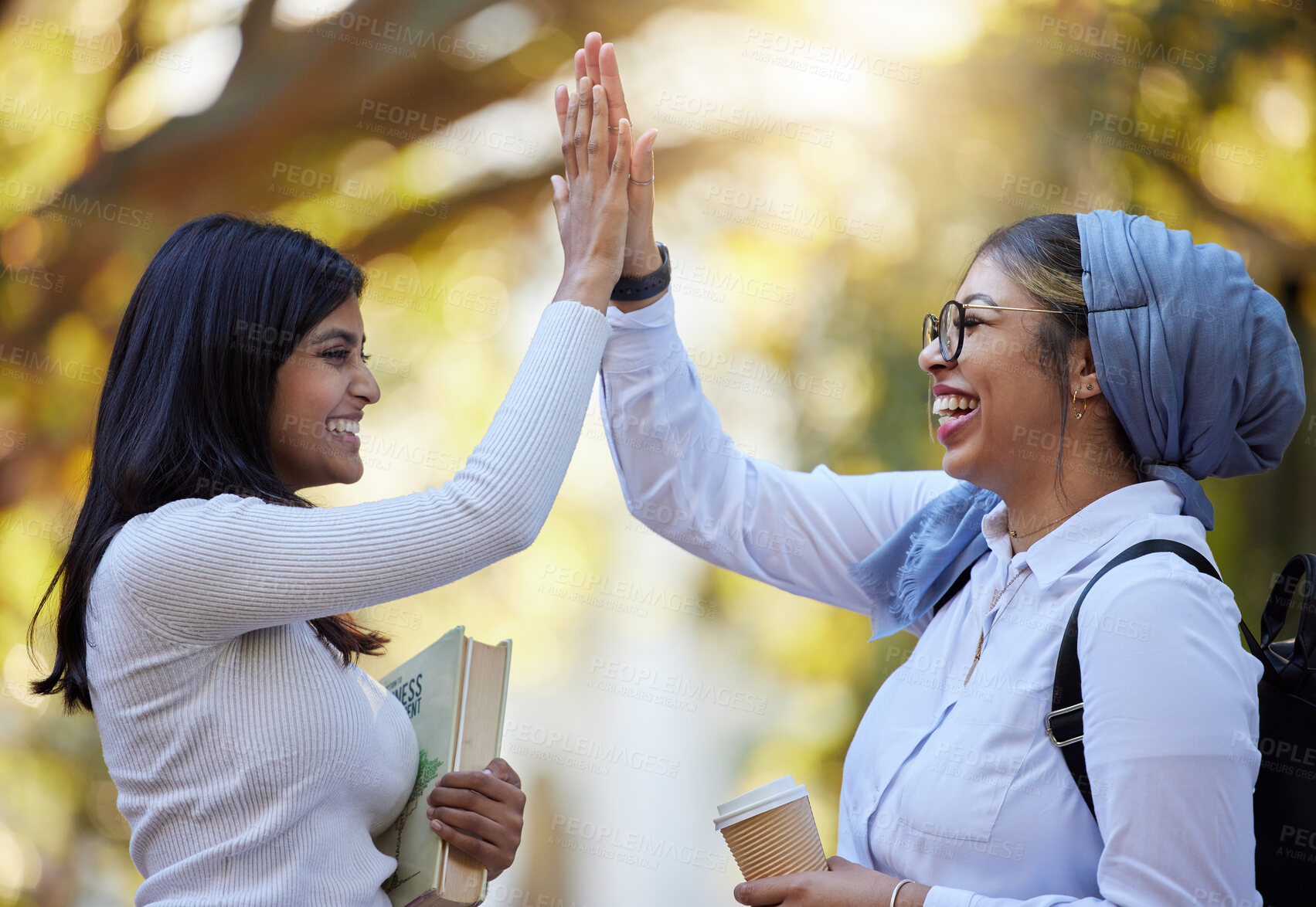 Buy stock photo High five, young women outdoor and friends with support, solidarity and happiness on college campus. Team agreement, happy female and success in class project, celebrate win and positive feedback