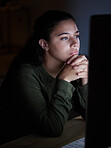 Thinking, night and woman on computer in office on computer for online project, proposal and planning. Concentration, focus and female worker working on pc for internet, network and website research