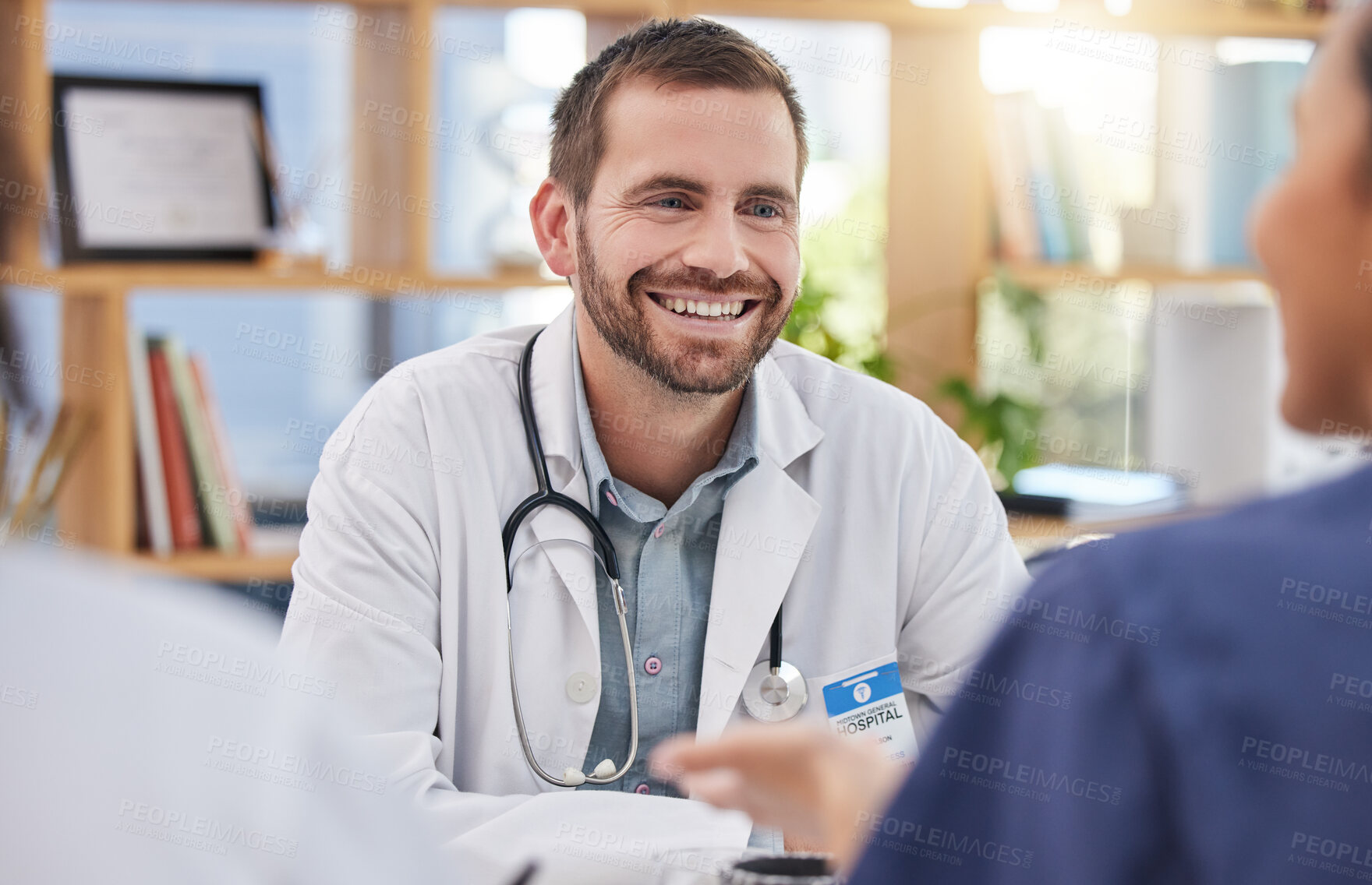 Buy stock photo Doctor, happy man and meeting healthcare team in hospital management, medicine and leadership discussion. Medical surgeon, smile and talking to employees in collaboration, clinic and surgery planning