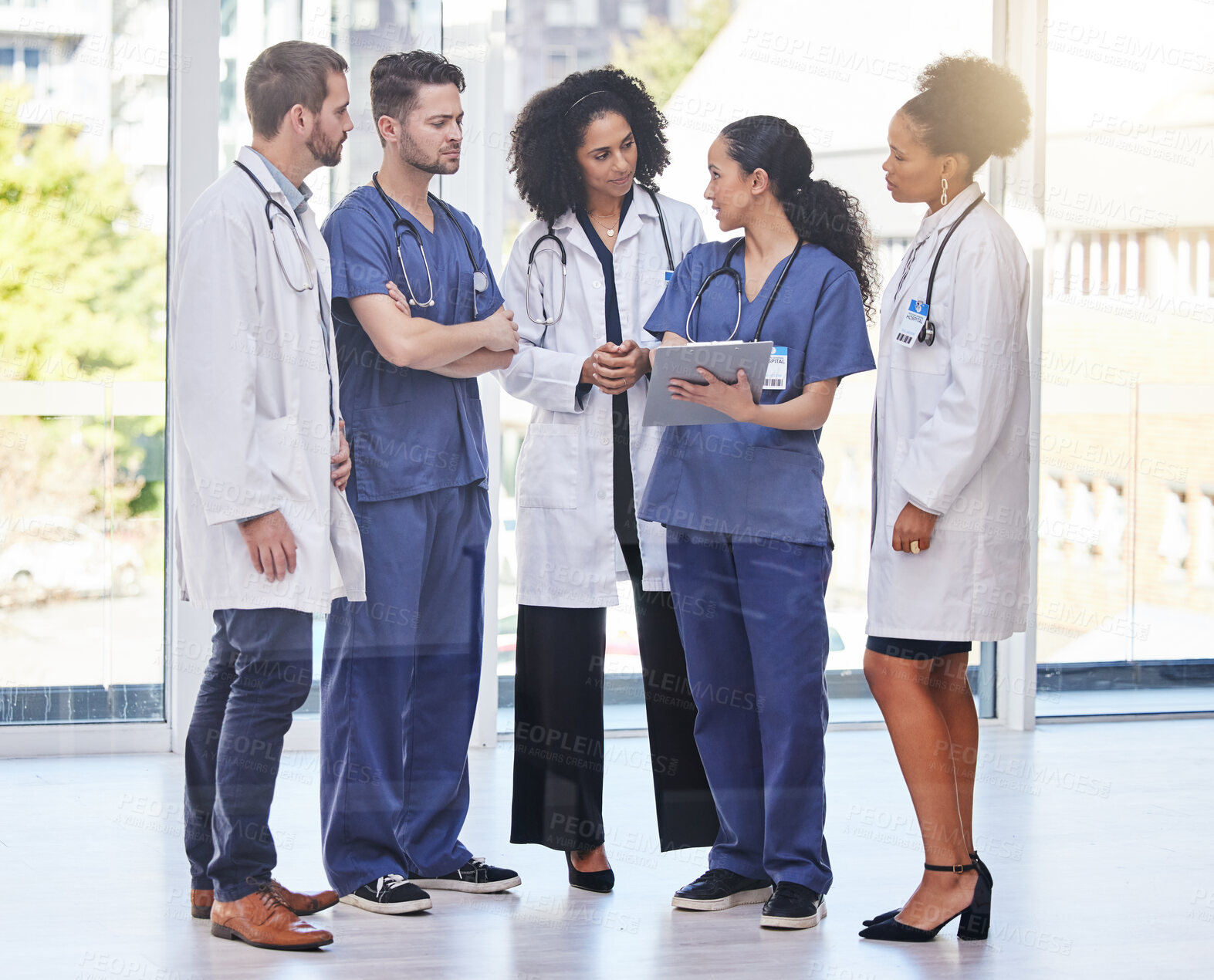 Buy stock photo Doctors, teamwork and medical discussion in hospital for surgery planning, agenda report and schedule. Diversity group of healthcare staff in collaboration of paperwork, research and medicine results