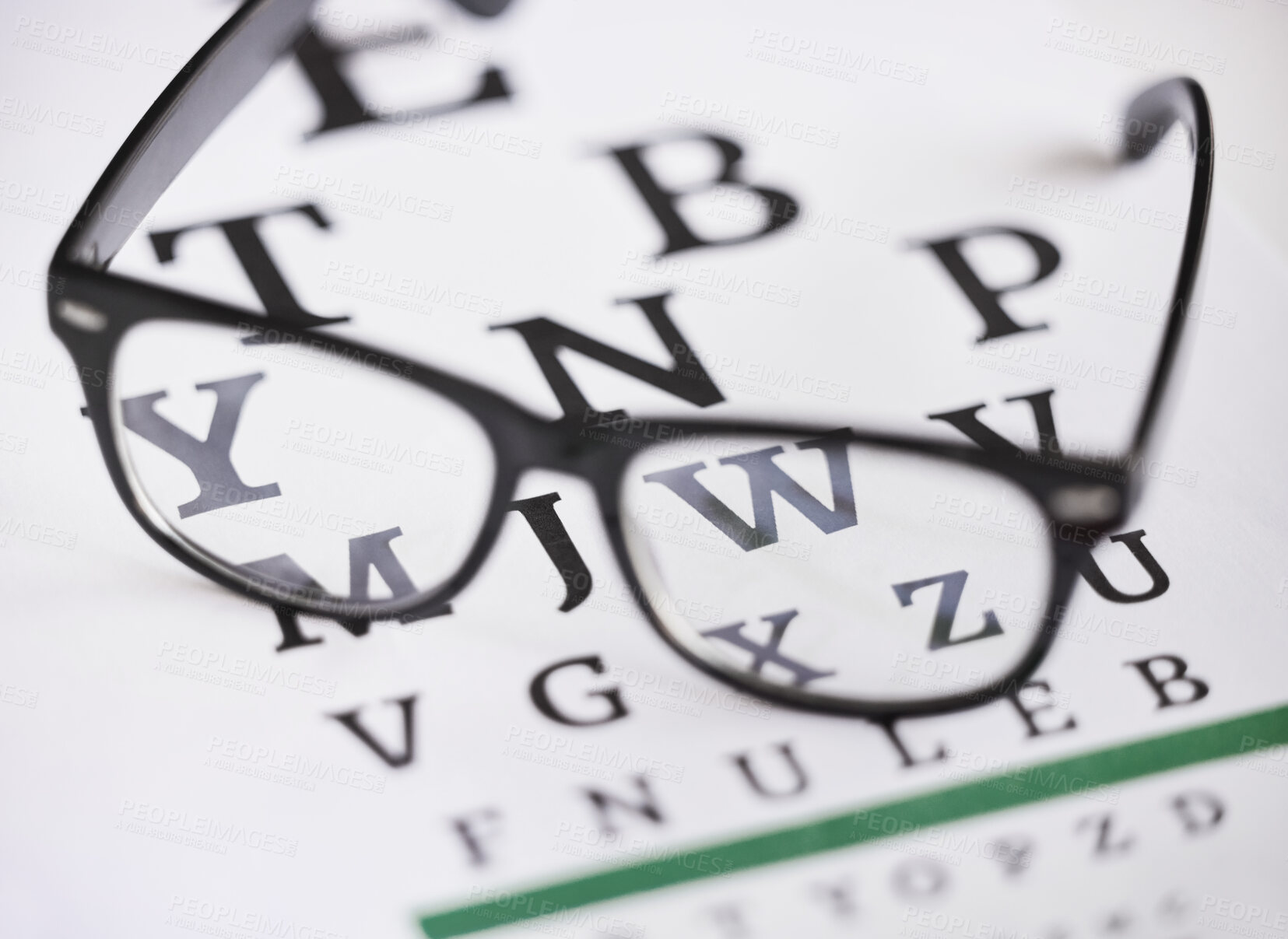 Buy stock photo Optometry, letter and healthcare with glasses and chart for focus, reading and eye test. Medical, optics and prescription with spectacles on text paper graph for myopia, sight and vision exam