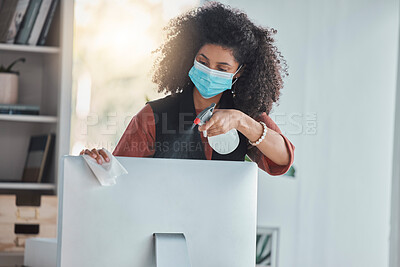 Buy stock photo Covid, compliance and a black woman cleaning her computer in the office for health, safety or control. Business, bacteria and regulations with a female employee wiping her desktop pc for disinfection